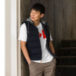 Front of Canada Flag white unisex basic softstyle t-shirt on male model with large Canadian flag printed across chest.