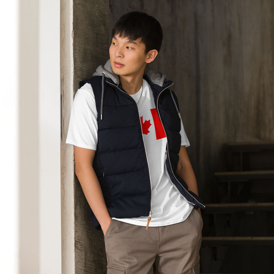 Front of Canada Flag white unisex basic softstyle t-shirt on male model with large Canadian flag printed across chest.