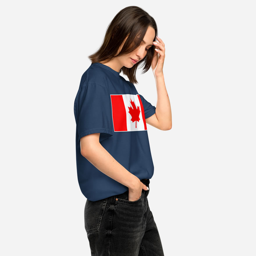 Front of Canada Flag navy unisex garment-dyed heavyweight t-shirt on female model with large Canadian flag printed across chest.