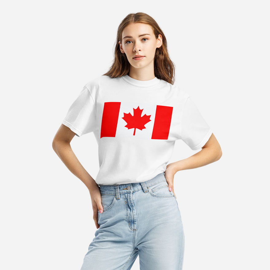 Front of Canada Flag white unisex garment-dyed heavyweight t-shirt on female model with large Canadian flag printed across chest.