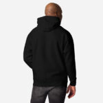 All black back of Elbows Up In Canada unisex premium hoodie by Team Canada on male model.