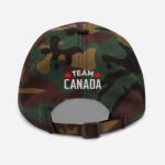 Back of I Love Canada green camo classic dad hat showing words 'Team Canada' embroidered white with small red maple leafs on each side.