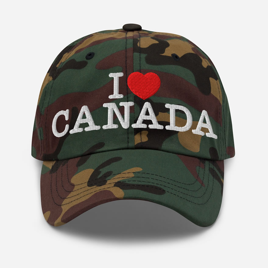 Front of I Love Canada green camo classic dad hat showing words 'I Love Canada' embroidered white with red heart for the word 'love'.