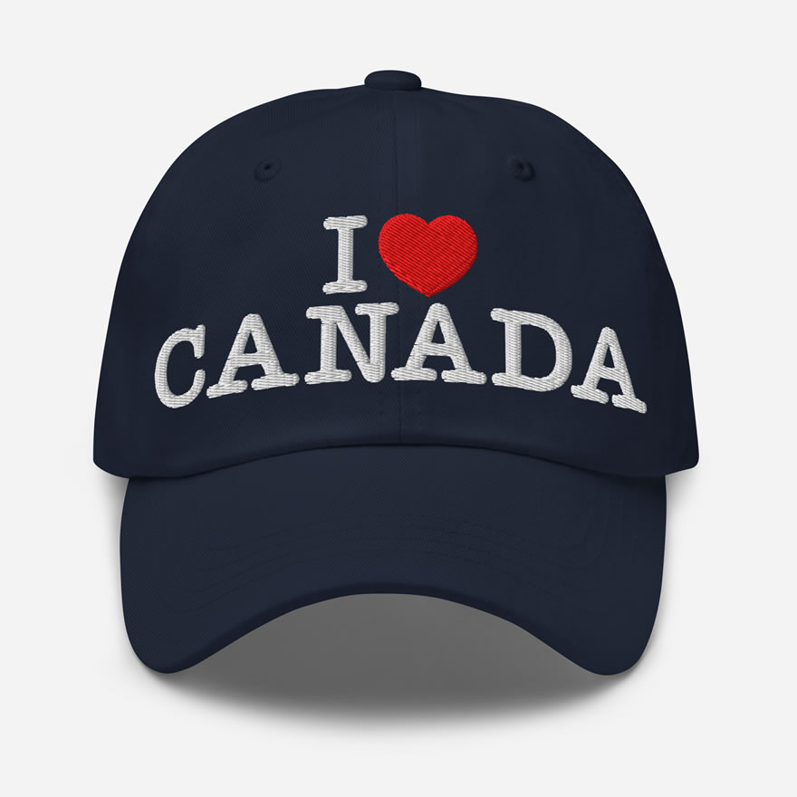 Front of I Love Canada navy classic dad hat showing words 'I Love Canada' embroidered white with a red heart in place of the word 'love'.
