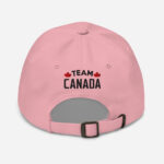 Back of I Love Canada pink classic dad hat showing words 'Team Canada' embroidered black with small red maple leafs on each side.