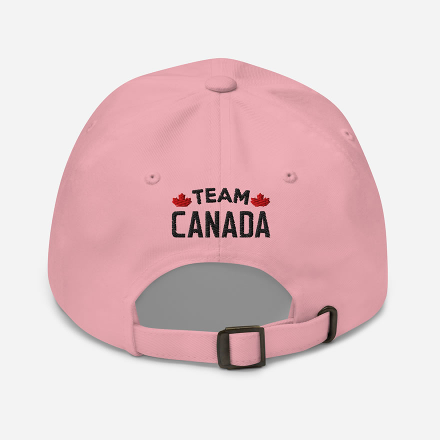Back of I Love Canada pink classic dad hat showing words 'Team Canada' embroidered black with small red maple leafs on each side.