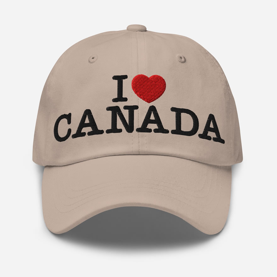 Front of I Love Canada stone classic dad hat showing words 'I Love Canada' embroidered black with red heart for the word 'love'.
