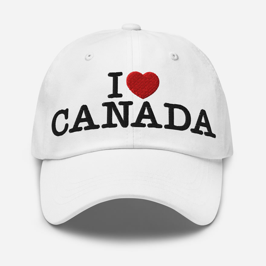 Front of I Love Canada white classic dad hat showing words 'I Love Canada' embroidered black with red heart for the word 'love'.