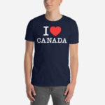 Front of I Love Canada navy unisex basic softstyle t-shirt on male model with 'I Love (heart) Canada' design across chest.