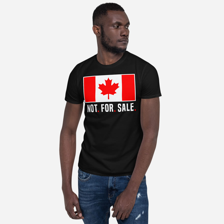 Front of Canada Is Not. For. Sale. black unisex basic softstyle t-shirt on male showing Canada Flag with words 'Not. For. Sale.' below in white.