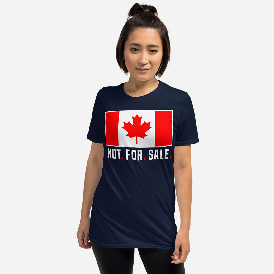 Front of Canada Is Not. For. Sale. navy unisex basic softstyle t-shirt on female showing Canada Flag with words 'Not. For. Sale.' below in white.