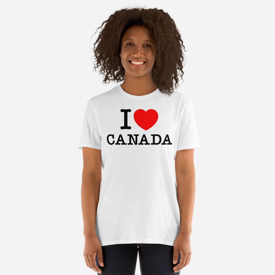 Front of I Love Canada white unisex basic softstyle t-shirt on female model with 'I Love (heart) Canada' design across chest.