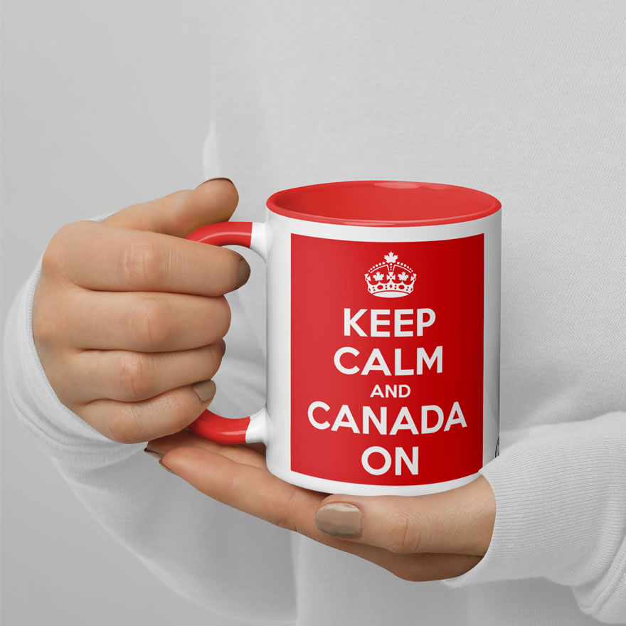 Keep Calm And Canada On ceramic 11oz mug w/ red inside & red handle held by female showing 'Keep Calm And Canada On' design.