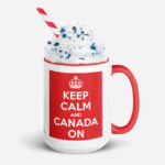 Keep Calm And Canada On white ceramic 15oz mug with red inside and red handle shown with whip cream topped drink and straw.
