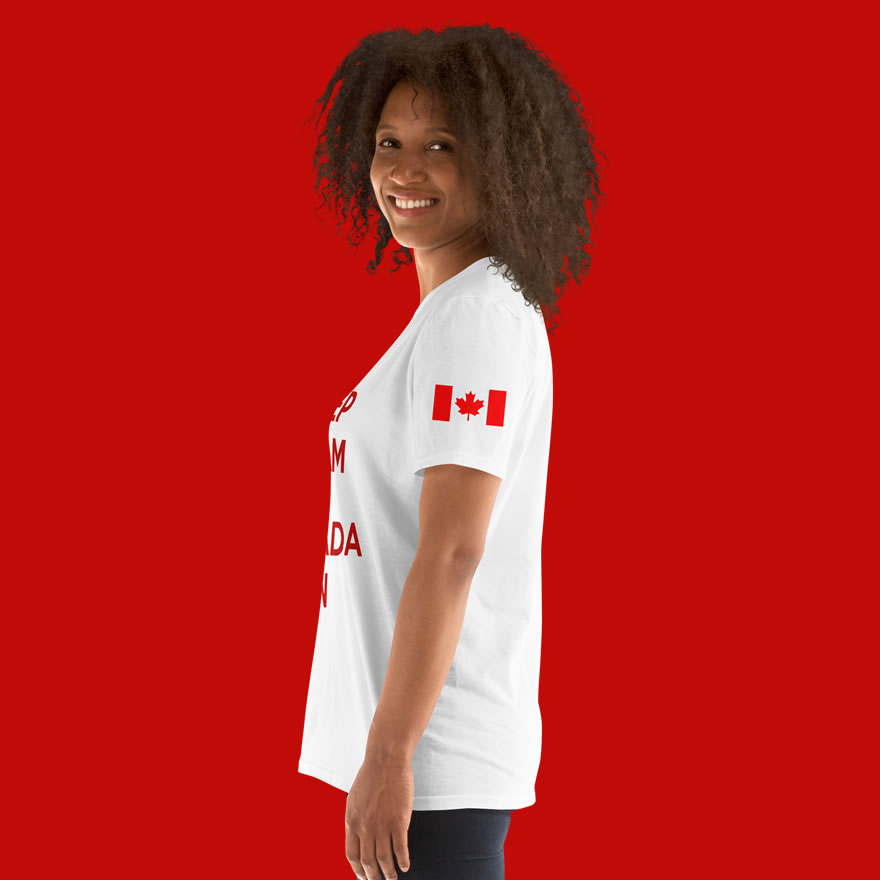 Left side of Keep Calm And Canada On white unisex basic softstyle t-shirt on female model with Canada Flag on left sleeve.