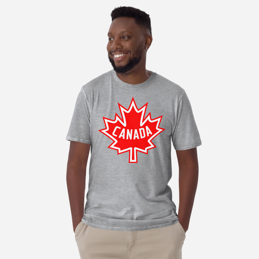 Front of Canada sport grey unisex basic softstyle t-shirt on male model with large red & white Maple Leaf print across chest.