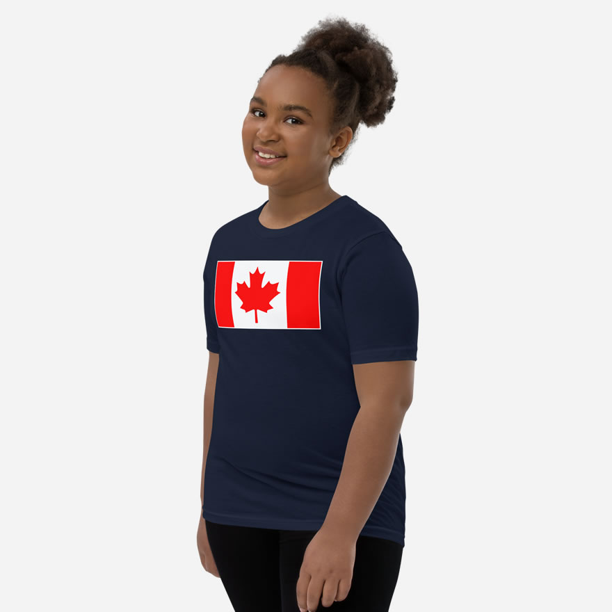 Front of Canada Flag navy unisex youth staple t-shirt on girl model showing large Canadian flag print.