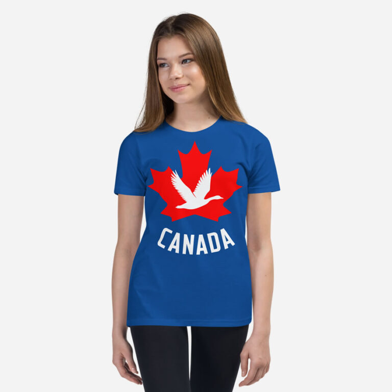 Front of Canada Goose true royal unisex youth staple t-shirt on girl showing maple leaf & goose print. Canada written below.