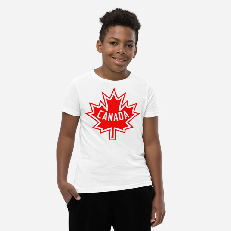 Front of Canada Flag white unisex youth staple t-shirt on boy model showing large red & white Maple Leaf design.
