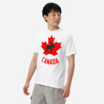 Front of Canada Moose white unisex heavyweight t-shirt on guy showing maple leaf & moose print. Canada written below.