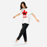 Front of Canada Polar Bear white unisex heavyweight t-shirt on girl with maple leaf & Polar Bear print. Canada written below.
