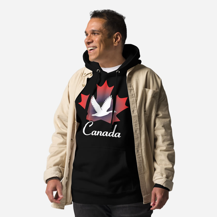 Front of Canada Goose black unisex premium hoodie on male showing maple leaf & goose print with Canada written below.