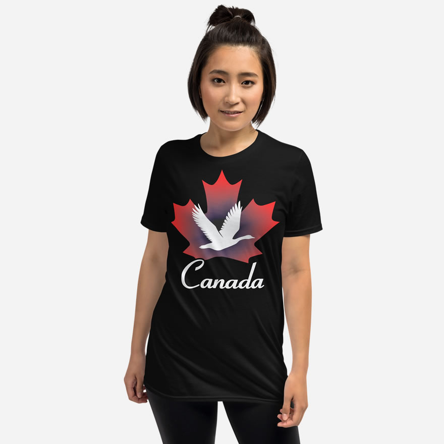 Front of Canada Goose black unisex softstyle t-shirt on female model showing maple leaf & goose print with Canada written below.