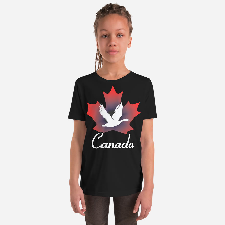 Front of Canada Goose black unisex youth staple t-shirt on girl showing maple leaf & goose print. Canada written below.