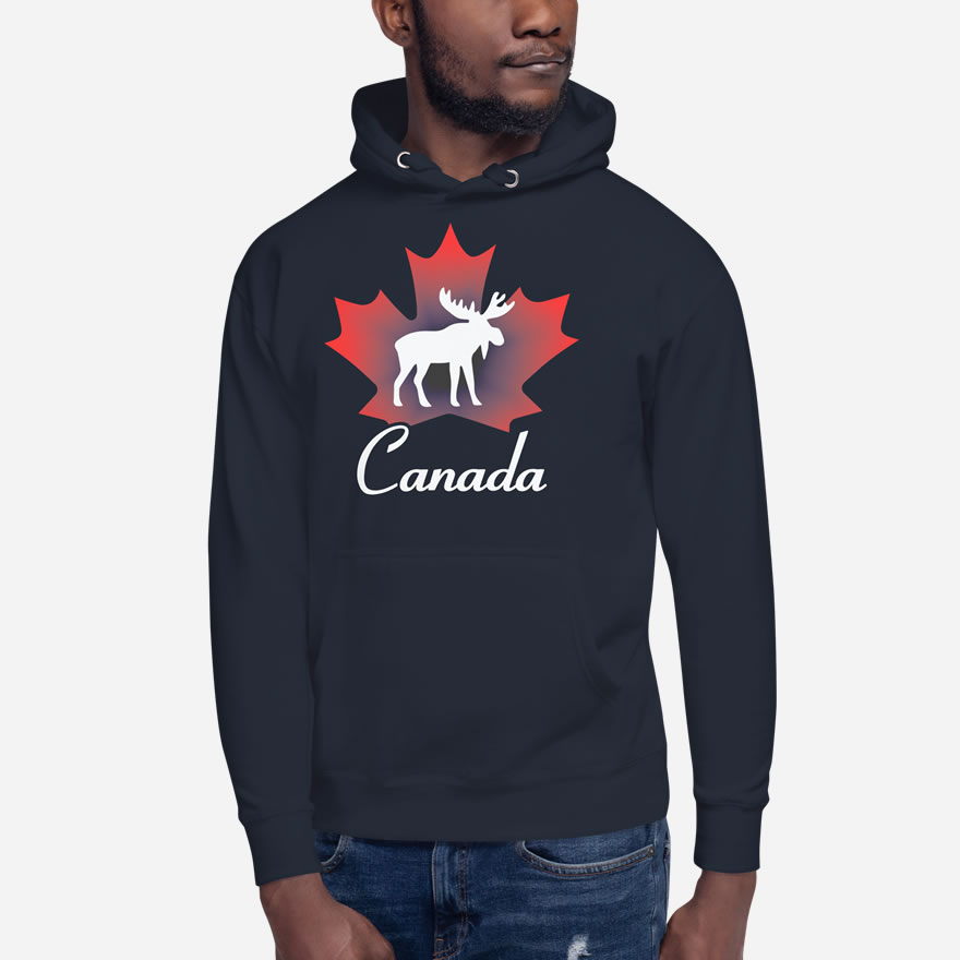 Front of Canada Moose navy blazer unisex premium hoodie on male showing maple leaf & moose print. Canada written below.