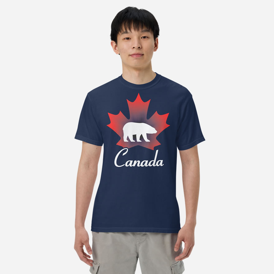 Front of Canada Polar Bear navy unisex heavyweight t-shirt on guy with maple leaf & Polar Bear print. Canada written below.