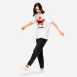 Front of Canada Polar Bear white unisex heavyweight t-shirt on girl with maple leaf & Polar Bear print. Canada written below.