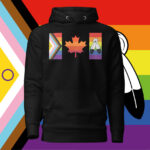 Front of Canada Two-Spirit Intersex-Inclusive Progress Pride Flag hoodie black premium pullover. Canada flag has pride stripes for the bars and maple leaf.