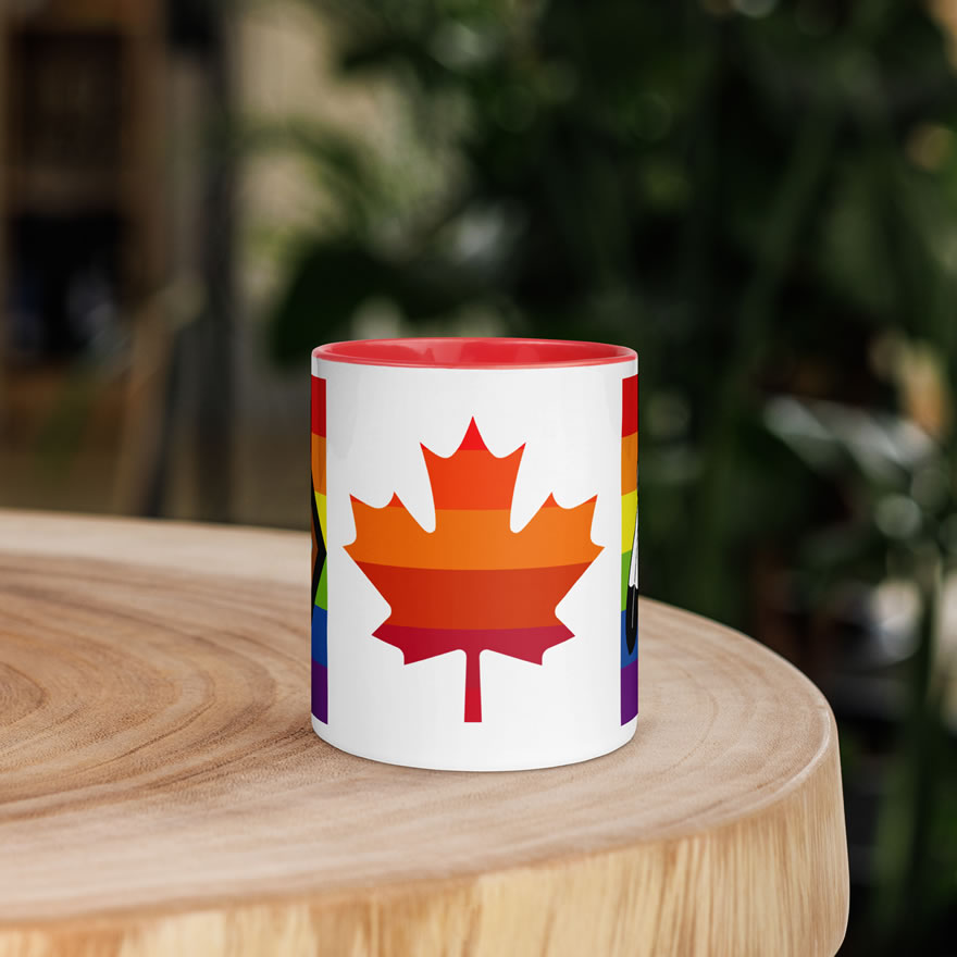 Canada Two-Spirit Intersex-Inclusive Progress Pride Flag mug 11oz red inside. Maple leaf is layered with 6 shades of red and orange pride stripes.