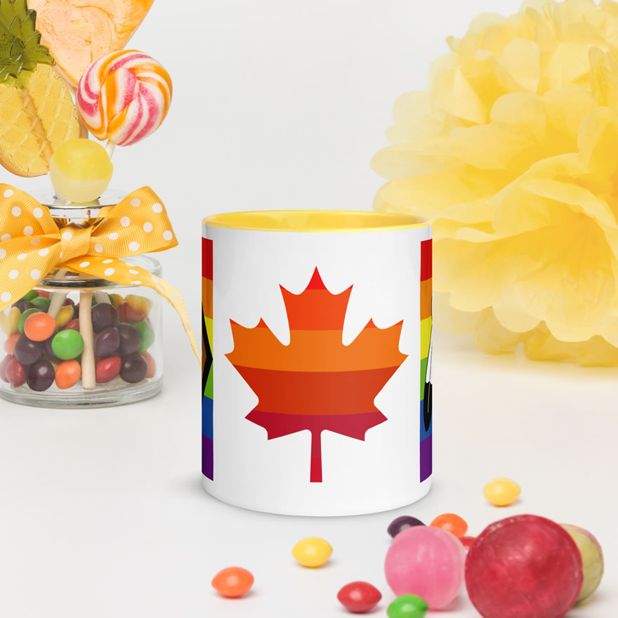 Canada Two-Spirit Intersex-Inclusive Progress Pride Flag mug 11oz yellow inside. Maple leaf is layered with 6 shades of red and orange pride stripes.