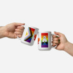 Two Canada Two-Spirit Intersex-Inclusive Progress Pride Flag white glossy 15oz mugs giving a 'cheers'. Shows colourful left and right bars side by side.