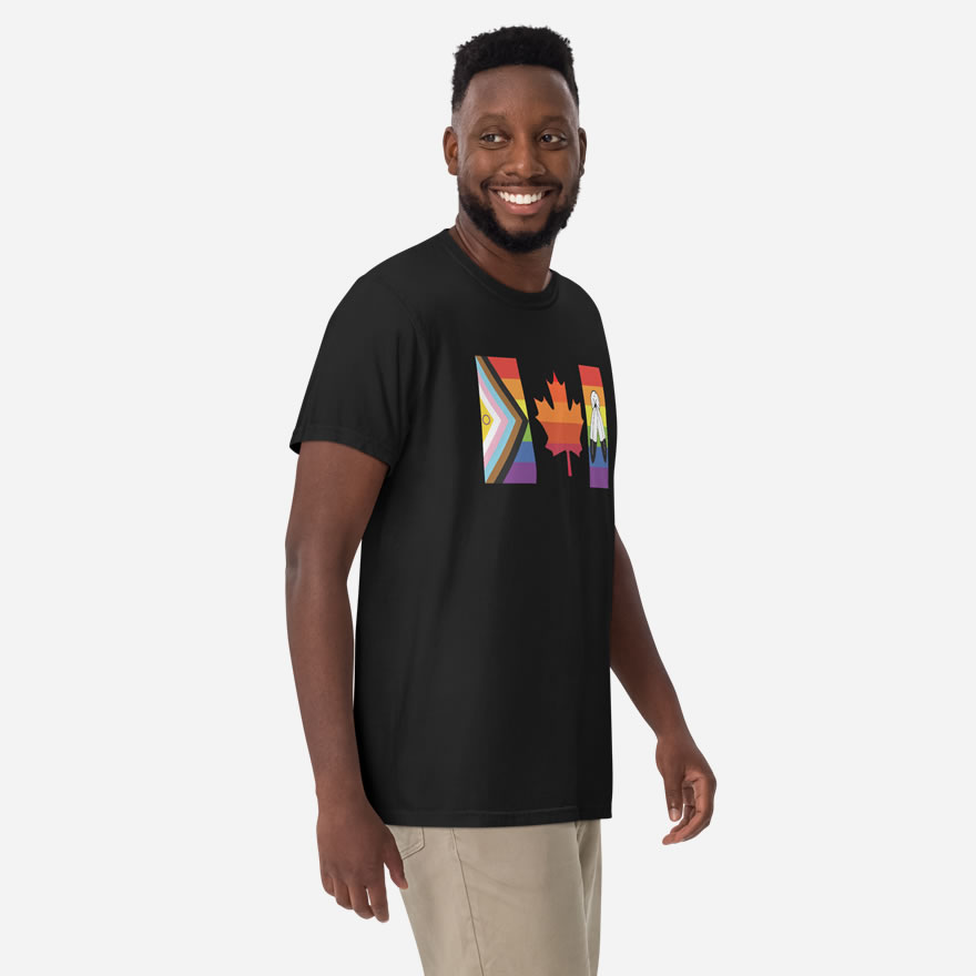 Front of Canada Two-Spirit Intersex-Inclusive Progress Pride Flag t-shirt black unisex heavyweight tee on model. Flag has pride stripes for bars and maple leaf.