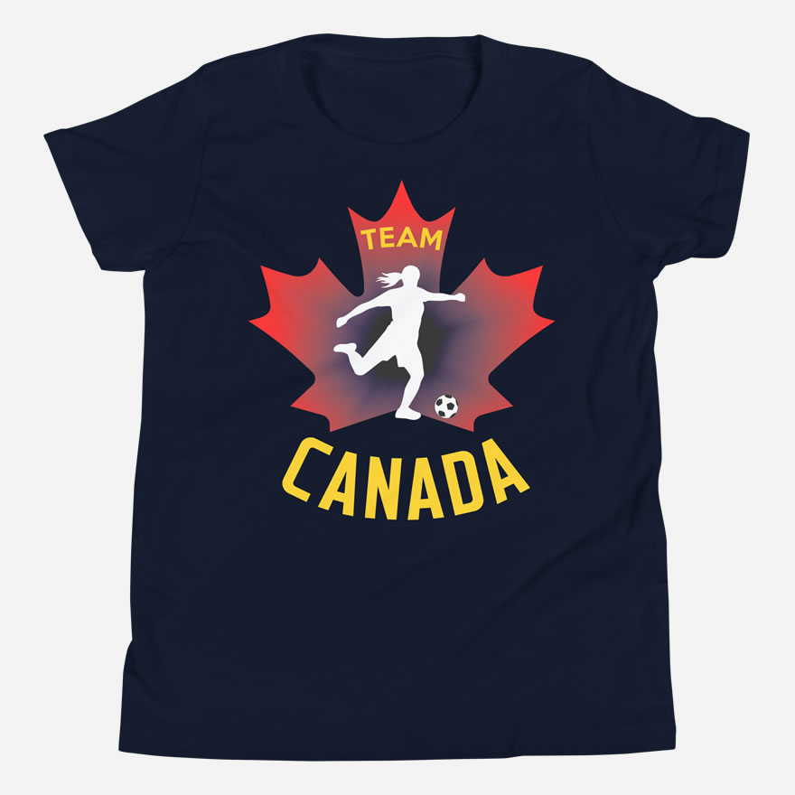 Front of Team Canada Girl's Soccer navy youth staple tee. Player kicking ball silhouette on red maple leaf. Says Team Canada.