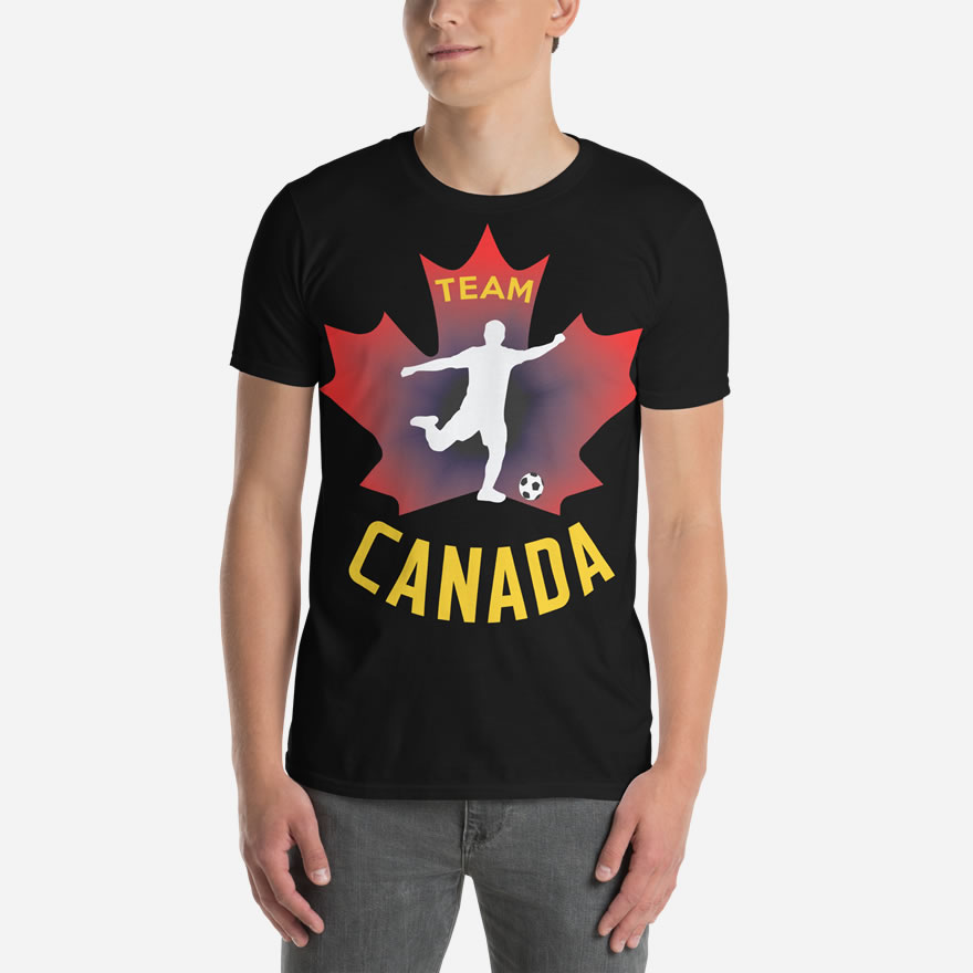 Front of Men's Soccer black unisex t-shirt on man. Player kicking ball silhouette on maple leaf. Tee says Team Canada.