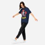 Front of Women's Soccer true navy heavyweight tee on woman. Player kicking ball silhouette on red maple leaf. Says Team Canada.