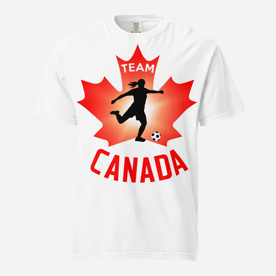 Front of Women's Soccer white unisex heavyweight t-shirt. Player kicking ball silhouette on red maple leaf. Says Team Canada.