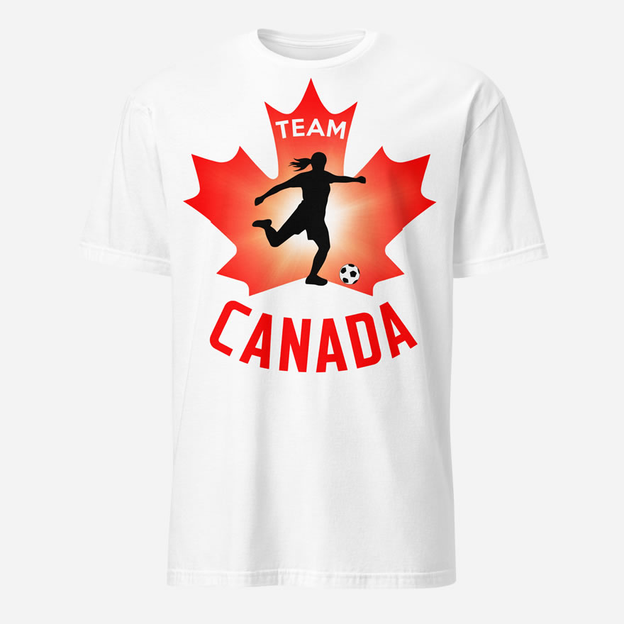 Front of Canadian Women's Soccer white unisex t-shirt. Player kicking ball on red maple leaf. Tee says Team Canada.