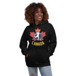 Front of Women's Soccer hoodie black unisex premium pullover on woman. Player kicking ball silhouette on maple leaf. Says Team Canada.