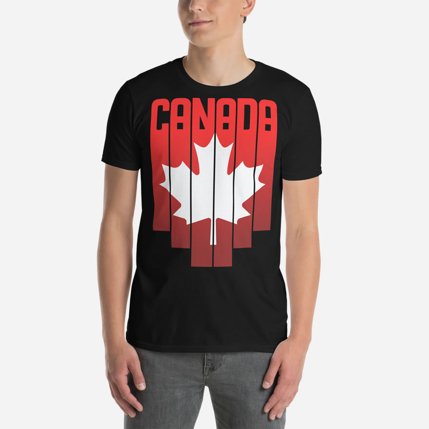 Front of Canada Red & White Maple Leaf t-shirt black softstyle tee on model. Word Canada on top with red bars & white maple leaf over bars.