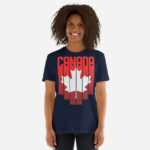 Front of Canada Red & White Maple Leaf t-shirt navy softstyle tee on model. Word Canada on top with red bars & white maple leaf.