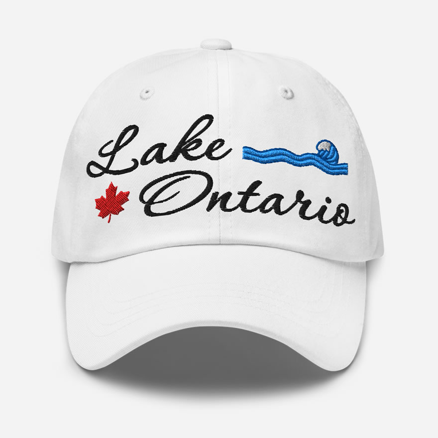 Front of Lake Ontario white classic dad hat showing 'Lake Ontario' embroidered black along with red maple leaf & blue wave.