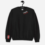 Front of black Canada True North sweatshirt embroidered in white, red with red maple leaf curved along neckline. Flag on right wrist.