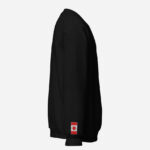 Right side of black Canada True North Maple Leaf sweatshirt showing Canada Flag embroidered on right wrist.