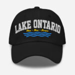 Front of Lake Ontario Canada black dad hat showing words 'Lake Ontario' atop wavy lines embroidered white above red maple leaves.